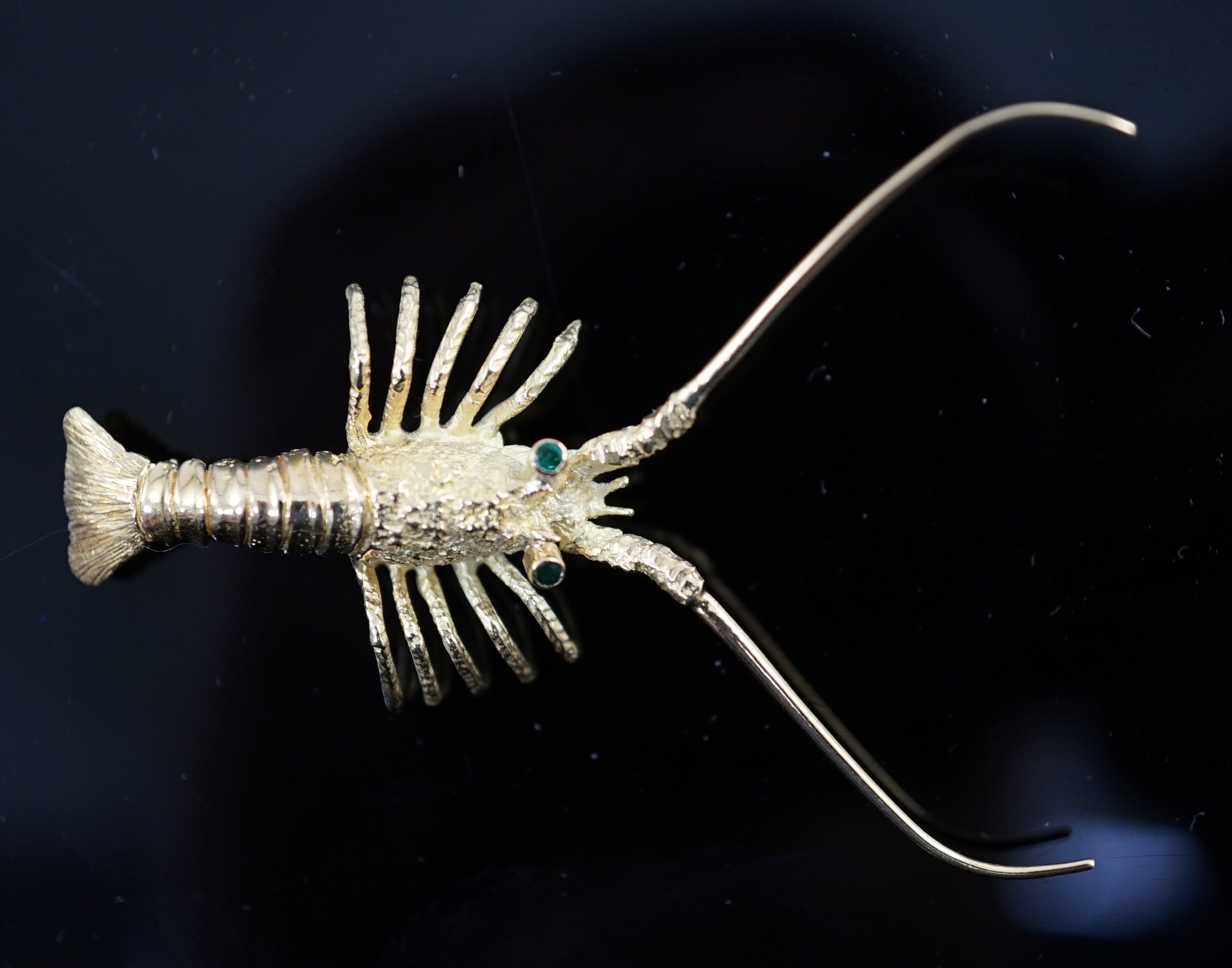 An Astwood Dickinson 18ct gold lobster brooch